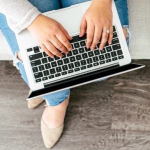 woman working on laptop computer
